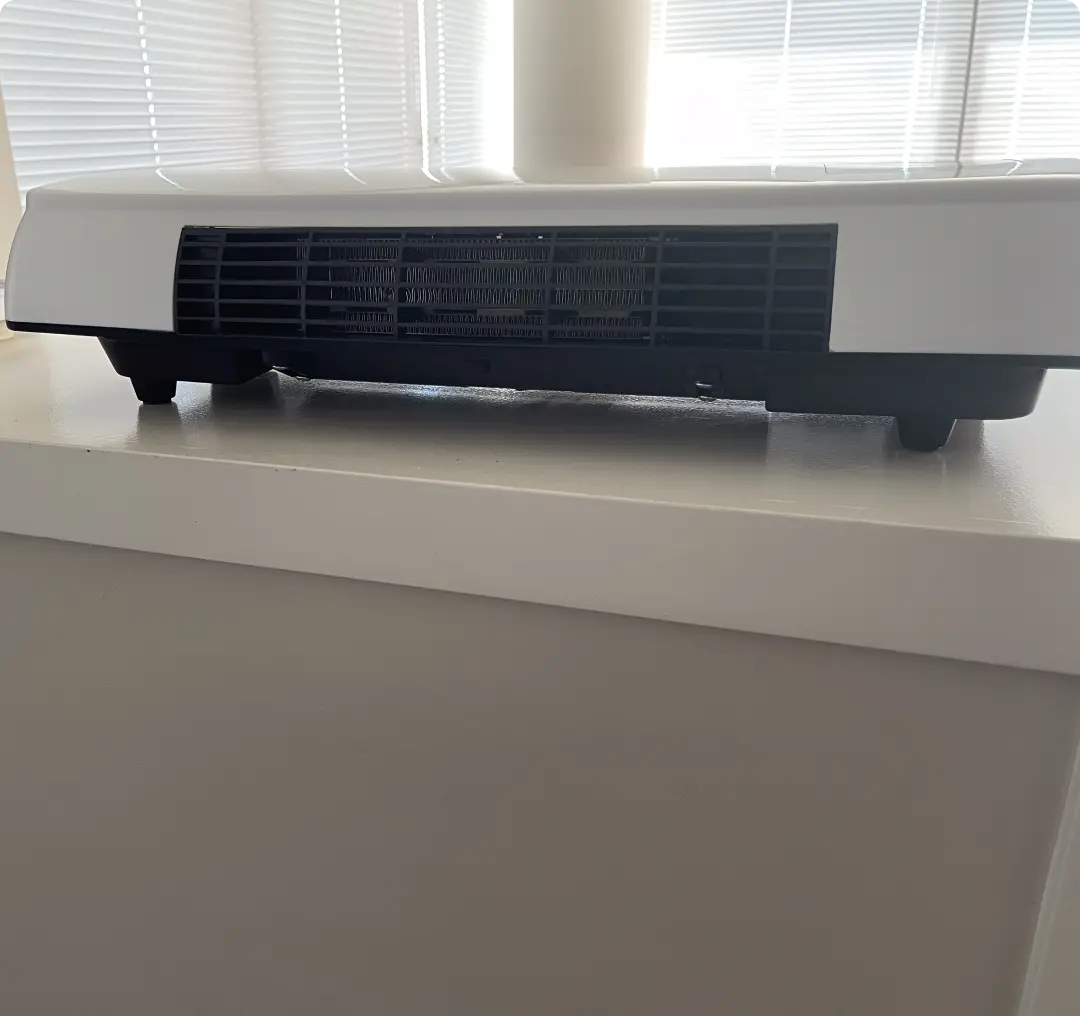 Patricia D. with her heater